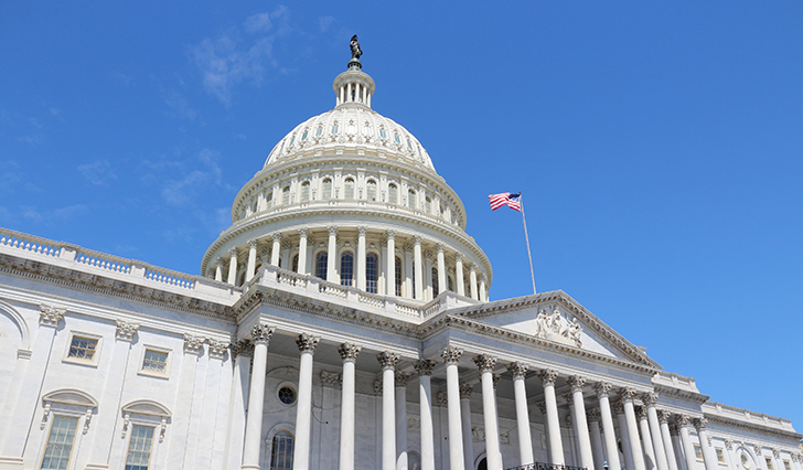 Washington DC, United States landmark. National Capitol building with US flag.